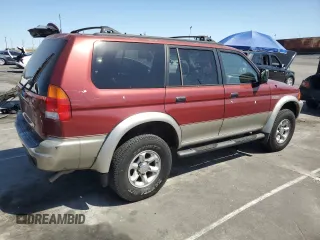 1999 Mitsubishi Montero LS z VIN JA4LS31H1XP034327, wystawiony jako Copart lot #52573485 z przebiegiem 286 753 mil mil oraz Szkoda całkowita • Salvage title. Historia ofert i sprzedaży dostępna na DreamBid. Obrazek 3.