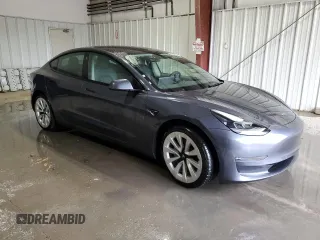 2022 Tesla Model 3 Long Range z VIN 5YJ3E1EB6NF289327, wystawiony jako Copart lot #58176825 z przebiegiem 120 883 mil mil oraz Czysty tytuł • Clean title. Historia ofert i sprzedaży dostępna na DreamBid. Obrazek 4.