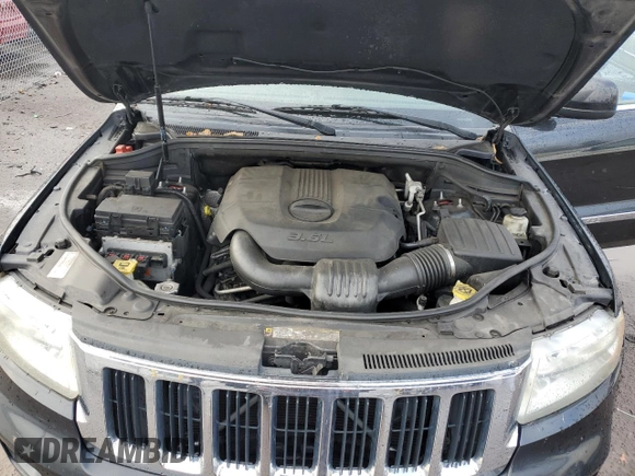 2011 Jeep Grand Cherokee Laredo with VIN 1J4RS4GG8BC508482, listed as a Copart auction lot 79261304 with 208,265 mi miles and Salvage Title. Bid and sale history available at DreamBid. Image 12.