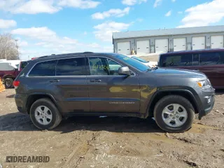 2015 Jeep Grand Cherokee Laredo with VIN 1C4RJFAG2FC133806, listed as a IAAI auction lot 41732455 with 67,955 mi miles. Bid and sale history available at carsss.com. Image 14.