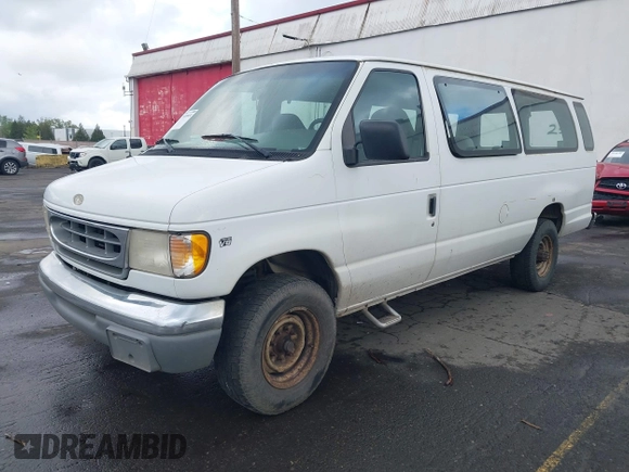 1997 Ford Econoline Wagon XL z VIN 1FBJS31L3VHB66356, wystawiony jako IAAI lot #39189974 z przebiegiem 242 944 mil mil oraz . Historia ofert i sprzedaży dostępna na DreamBid. Obrazek 2.