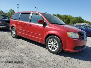 2014 Dodge Grand Caravan SXT with VIN 2C4RDGCG5ER182160, listed as a Copart auction lot 54140505 with 61,576 mi miles and Salvage Title. Bid and sale history available at DreamBid. Image 4.