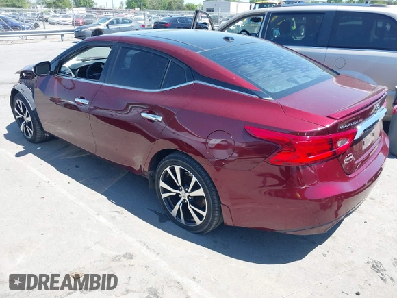 2016 Nissan Maxima SL with VIN 1N4AA6AP2GC408837, listed as a IAAI auction lot 42006849 with 228,119 mi miles and . Bid and sale history available at DreamBid. Image 3.