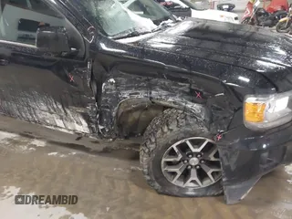 2016 GMC Canyon 4WD SLE with VIN 1GTG6CE30G1365705, listed as a IAAI auction lot 41836373 with 146,111 mi miles and . Bid and sale history available at carsss.com. Image 6.