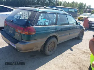 1998 Subaru Legacy Outback with VIN 4S3BG6857W7617838, listed as a IAAI auction lot 42800728 with 219,079 mi miles and . Bid and sale history available at DreamBid. Image 4.