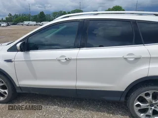 2016 Ford Escape Titanium z VIN 1FMCU9J90GUC76504, wystawiony jako IAAI lot #42552851 z przebiegiem 89 570 mil mil oraz . Historia ofert i sprzedaży dostępna na DreamBid. Obrazek 15.
