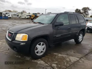 2003 GMC Envoy SLE with VIN 1GKDS13S632226264, listed as a Copart auction lot 82461694 with 0 mi miles and Clean Title. Bid and sale history available at carsss.com. Image 1.