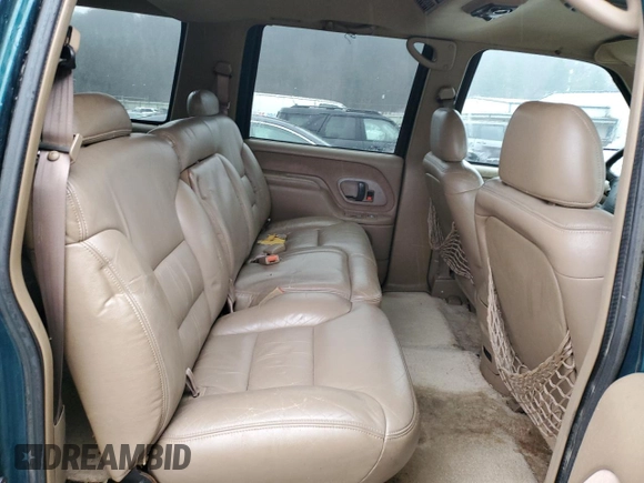 1995 GMC Suburban z VIN 1GKFK16K0SJ748087, wystawiony jako Copart lot #85121834 z przebiegiem 191 550 mil mil oraz Szkoda całkowita • Salvage title. Historia ofert i sprzedaży dostępna na DreamBid. Obrazek 11.