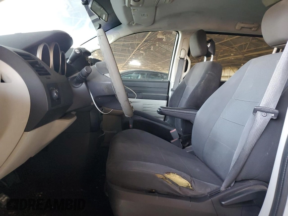 2009 Dodge Grand Caravan SE with VIN 1D8HN44E09B511597, listed as a Copart auction lot 61754875 with 410,045 mi miles and Clean title. Bid and sale history available at DreamBid. Image 7.