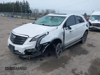2019 Cadillac XT5 Luxury AWD z VIN 1GYKNDRS2KZ301027, wystawiony jako IAAI lot #41750374 z przebiegiem 44 328 mil mil oraz . Historia ofert i sprzedaży dostępna na DreamBid. Obrazek 22.