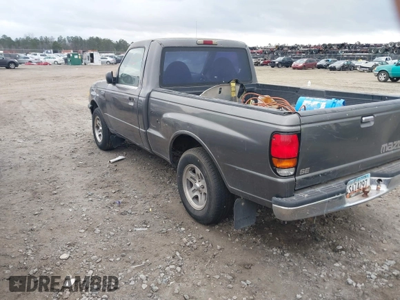 2000 Mazda B-Series Truck SX with VIN 4F4YR12C9YTM23599, listed as a IAAI auction lot 41393276 with 232,789 mi miles and . Bid and sale history available at DreamBid. Image 3.