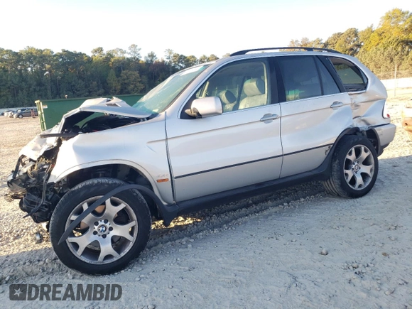 2000 BMW X5 4.4i with VIN WBAFB3355YLH05755, listed as a Copart auction lot 77136744 with 0 mi miles and Salvage Title. Bid and sale history available at carsss.com. Image 1.