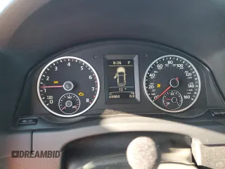 2014 Volkswagen Tiguan SEL with VIN WVGAV3AX0EW555873, listed as a Copart auction lot 55695955 with 69,984 mi miles and Salvage title. Bid and sale history available at DreamBid. Image 9.