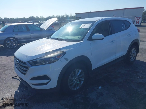 2018 Hyundai Tucson SE with VIN KM8J23A42JU627533, listed as a IAAI auction lot 41880112 with 61,840 mi miles. Bid and sale history available at carsss.com. Image 18.