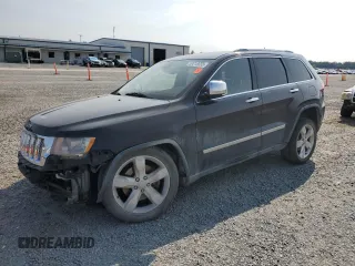 2011 Jeep Grand Cherokee Overland Summit with VIN 1J4RR6GT3BC686143, listed as a Copart auction lot 59218685 with 155,059 mi miles and Salvage title. Bid and sale history available at DreamBid. Image 1.