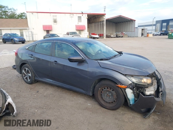 2019 Honda Civic Sedan LX with VIN 19XFC2F60KE018100, listed as a IAAI auction lot 41908486 with 124,357 mi miles. Bid and sale history available at carsss.com. Image 13.