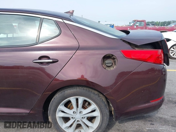2012 Kia Optima LX z VIN 5XXGM4A70CG012349, wystawiony jako IAAI lot #42290950 z przebiegiem 112 293 mil mil oraz . Historia ofert i sprzedaży dostępna na DreamBid. Obrazek 15.