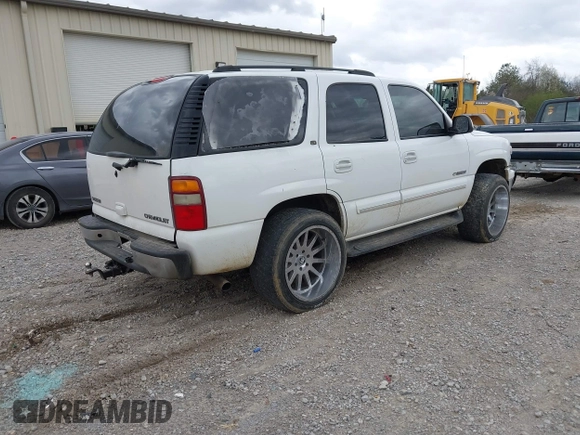 2003 Chevrolet Tahoe LS with VIN 1GNEC13Z73R126800, listed as a IAAI auction lot 41848636 with 267,234 mi miles and . Bid and sale history available at DreamBid. Image 4.