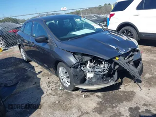 2017 Ford Focus S z VIN 1FADP3E29HL269607, wystawiony jako IAAI lot #41654836 z przebiegiem 101 645 mil mil oraz . Historia ofert i sprzedaży dostępna na DreamBid. Obrazek 1.