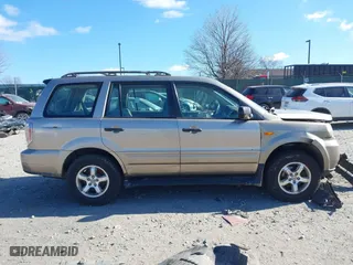 2007 Honda Pilot LX with VIN 5FNYF28127B038187, listed as a IAAI auction lot 41639252 with 149,548 mi miles. Bid and sale history available at carsss.com. Image 12.