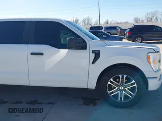 2021 Ford F-150 XL with VIN 1FTEW1CP2MFA09742, listed as a IAAI auction lot 41675603 with 94,983 mi miles. Bid and sale history available at carsss.com. Image 14.