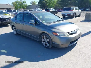 2006 Honda Civic LX z VIN 2HGFA16556H526744, wystawiony jako IAAI lot #42360805 z przebiegiem 236 970 mil mil oraz . Historia ofert i sprzedaży dostępna na DreamBid. Obrazek 1.
