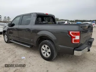 2020 Ford F-150 XL with VIN 1FTEW1CB1LKD56067, listed as a Copart auction lot 87887395 with 106,980 mi miles and Salvage Title. Bid and sale history available at carsss.com. Image 2.