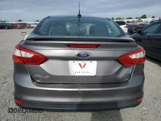 2012 Ford Focus SE with VIN 1FAHP3F27CL335046, listed as a Copart auction lot 55235175 with 128,119 mi miles and Salvage title. Bid and sale history available at DreamBid. Image 6.
