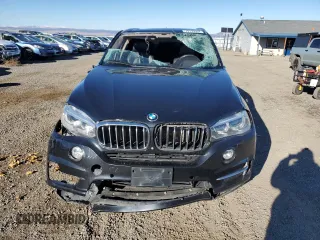2014 BMW X5 xDrive35i z VIN 5UXKR0C59E0K51868, wystawiony jako Copart lot #79139994 z przebiegiem Nie podano mil oraz Szkoda całkowita • Salvage title. Historia ofert i sprzedaży dostępna na DreamBid. Obrazek 5.