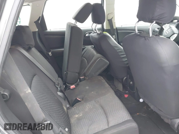 2014 Dodge Journey SE with VIN 3C4PDCAB0ET182376, listed as a IAAI auction lot 41569006 with 106,024 mi miles and . Bid and sale history available at DreamBid. Image 8.