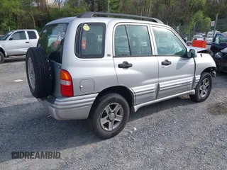 2002 Chevrolet Tracker LT z VIN 2CNBJ634926935241, wystawiony jako IAAI lot #42086260 z przebiegiem Nie podano mil oraz . Historia ofert i sprzedaży dostępna na DreamBid. Obrazek 4.