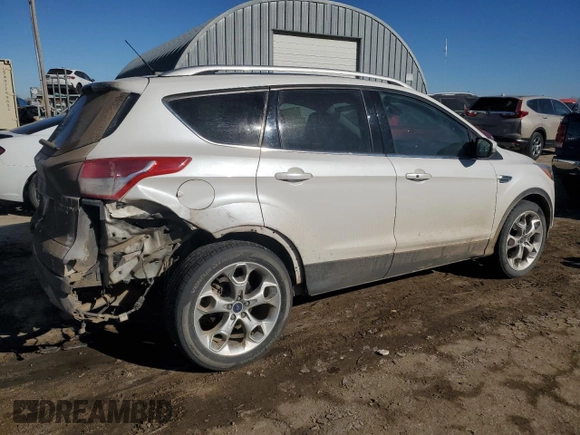2015 Ford Escape Titanium with VIN 1FMCU9JX7FUA42373, listed as a Copart auction lot 42135485 with 121,080 mi miles and Salvage Title. Bid and sale history available at carsss.com. Image 3.