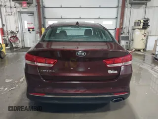 2016 Kia Optima LX with VIN 5XXGT4L3XGG073744, listed as a IAAI auction lot 41586212 with 111,628 mi miles. Bid and sale history available at carsss.com. Image 16.