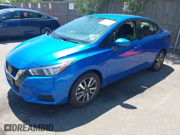 2021 Nissan Versa SV with VIN 3N1CN8EV1ML855643, listed as a IAAI auction lot 42772321 with 56,604 mi miles and . Bid and sale history available at DreamBid. Image 2.