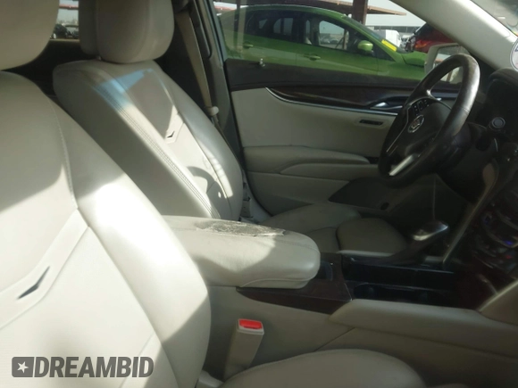 2014 Cadillac XTS Luxury with VIN 2G61M5S35E9199253, listed as a IAAI auction lot 41400558 with 112,955 mi miles. Bid and sale history available at carsss.com. Image 5.