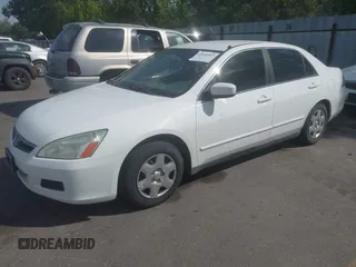 2007 Honda Accord LX with VIN 1HGCM56457A039536, listed as a IAAI auction lot 42640467 with 303,475 mi miles and . Bid and sale history available at DreamBid. Image 2.