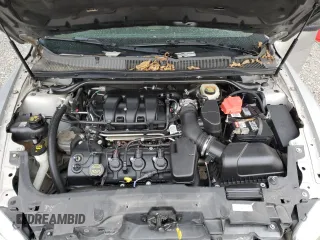 2014 Ford Taurus SE with VIN 1FAHP2D87EG164232, listed as a Copart auction lot 83407024 with 156,348 mi miles and Salvage Title. Bid and sale history available at DreamBid. Image 12.