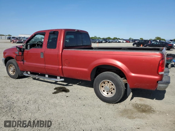 2002 Ford F-250 XL with VIN 1FTNX20F02EB64128, listed as a Copart auction lot 51979895 with 162,117 mi miles and Salvage title. Bid and sale history available at DreamBid. Image 2.