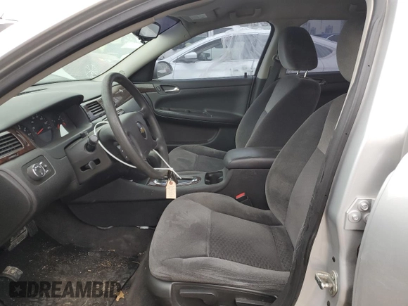 2015 Chevrolet Impala LS with VIN 2G1WA5E3XF1156723, listed as a Copart auction lot 44007025 with 99,349 mi miles and Salvage title. Bid and sale history available at DreamBid. Image 7.