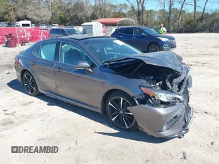 2019 Toyota Camry XSE with VIN 4T1B61HK1KU812353, listed as a IAAI auction lot 41671046 with 60,488 mi miles. Bid and sale history available at carsss.com. Image 1.