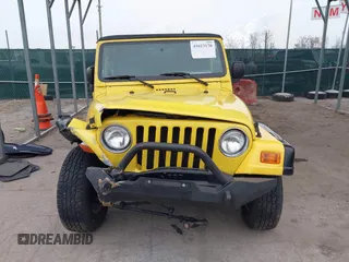 2004 Jeep Wrangler X with VIN 1J4FA39S74P726202, listed as a IAAI auction lot 41613170 with 120,319 mi miles and . Bid and sale history available at DreamBid. Image 12.