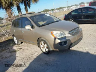 2007 Kia Rondo LX with VIN KNAFG526977114033, listed as a IAAI auction lot 40967531 with 126,761 mi miles. Bid and sale history available at carsss.com. Image 1.
