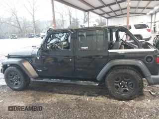 2021 Jeep Wrangler Unlimited Willys with VIN 1C4HJXDN2MW725181, listed as a IAAI auction lot 41731361 with 53,505 mi miles and . Bid and sale history available at DreamBid. Image 14.