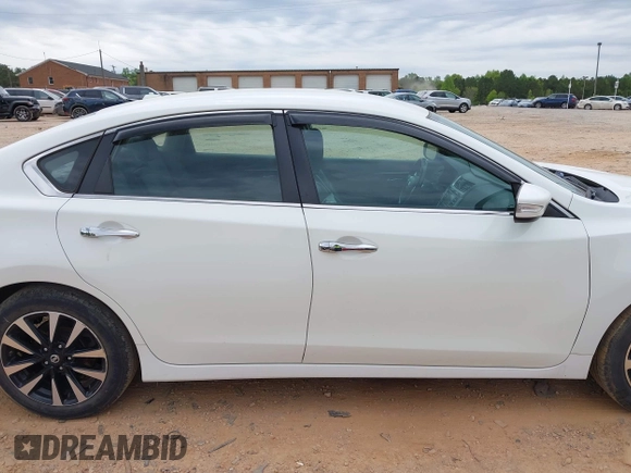 2018 Nissan Altima S with VIN 1N4AL3AP9JC128686, listed as a IAAI auction lot 42038517 with 159,024 mi miles and . Bid and sale history available at DreamBid. Image 13.