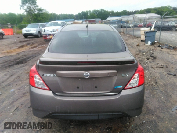 2015 Nissan Versa SV with VIN 3N1CN7AP7FL869485, listed as a IAAI auction lot 42077524 with 198,646 mi miles. Bid and sale history available at carsss.com. Image 16.