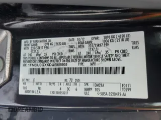 2013 Ford Escape SE with VIN 1FMCU0GXXDUB65505, listed as a Copart auction lot 46140355 with 256,902 mi miles and Salvage title. Bid and sale history available at DreamBid. Image 13.