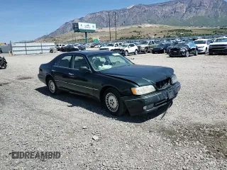1999 Infiniti Q45 z VIN JNKBY31A6XM600579, wystawiony jako Copart lot #57683075 z przebiegiem 215 415 mil mil oraz Szkoda całkowita • Salvage title. Historia ofert i sprzedaży dostępna na DreamBid. Obrazek 14.