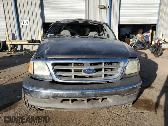2003 Ford F-150 XL with VIN 1FTRF072X3KC94240, listed as a Copart auction lot 86130954 with 101,042 mi miles and Salvage title. Bid and sale history available at DreamBid. Image 5.