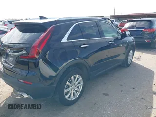 2023 Cadillac XT4 FWD Luxury with VIN 1GYAZAR47PF159153, listed as a IAAI auction lot 41580375 with 24,362 mi miles and . Bid and sale history available at DreamBid. Image 4.