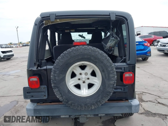 2004 Jeep Wrangler Sport with VIN 1J4FA49S64P794559, listed as a IAAI auction lot 41644201 with 107,445 mi miles. Bid and sale history available at carsss.com. Image 17.